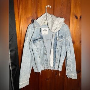 This jean jacket from Hollister is a medium. The bottom is distressed